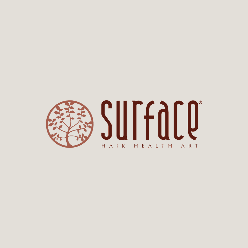 Surface logo with a tree icon and the tagline "Hair Health Art".