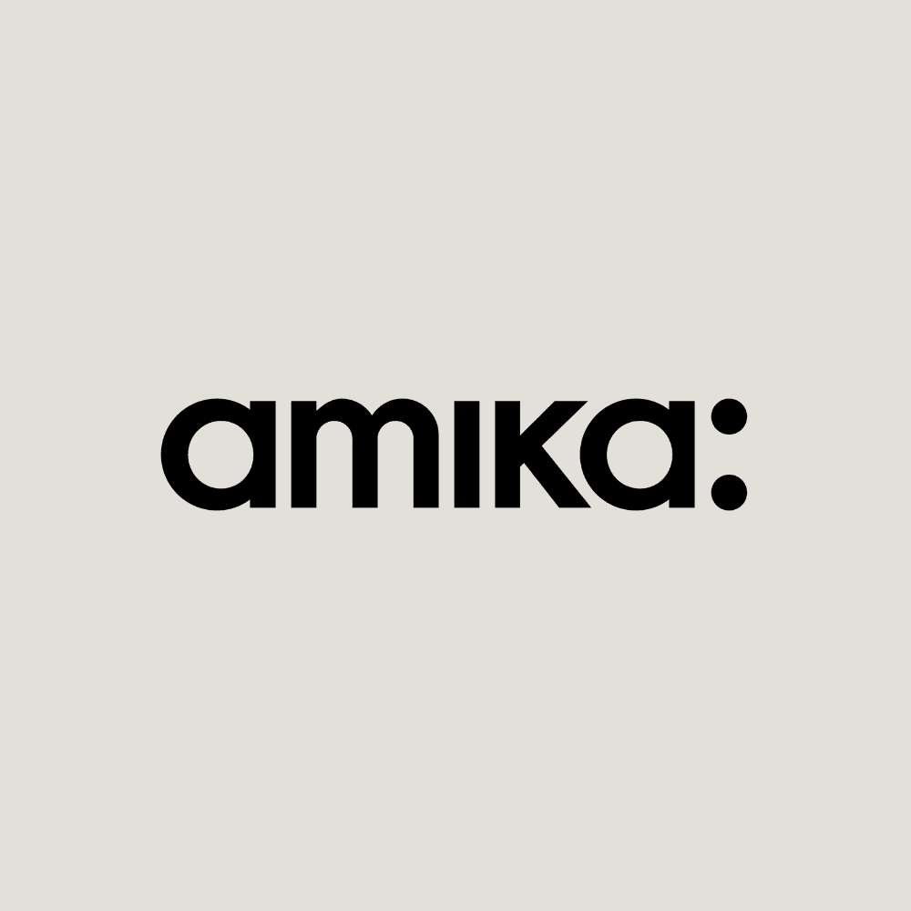 amika: logo with lowercase black text on a gray background.