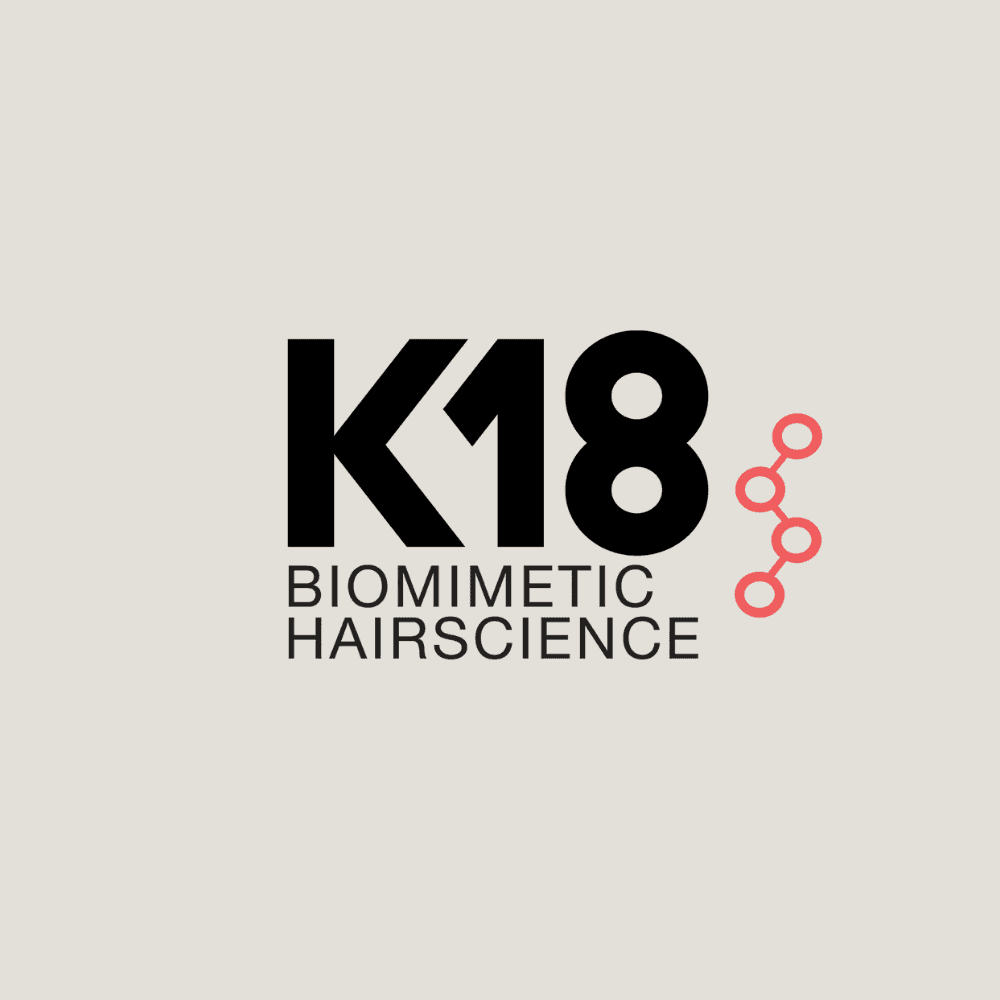 K18 Biomimetic Hairscience logo with a molecular design on the right side.